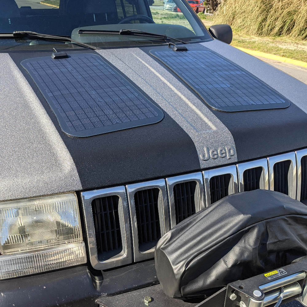 Cascadia 4x4 dual hood solar panel system for the grand cherokee ZJ and WJ perfect for overlanding and camping